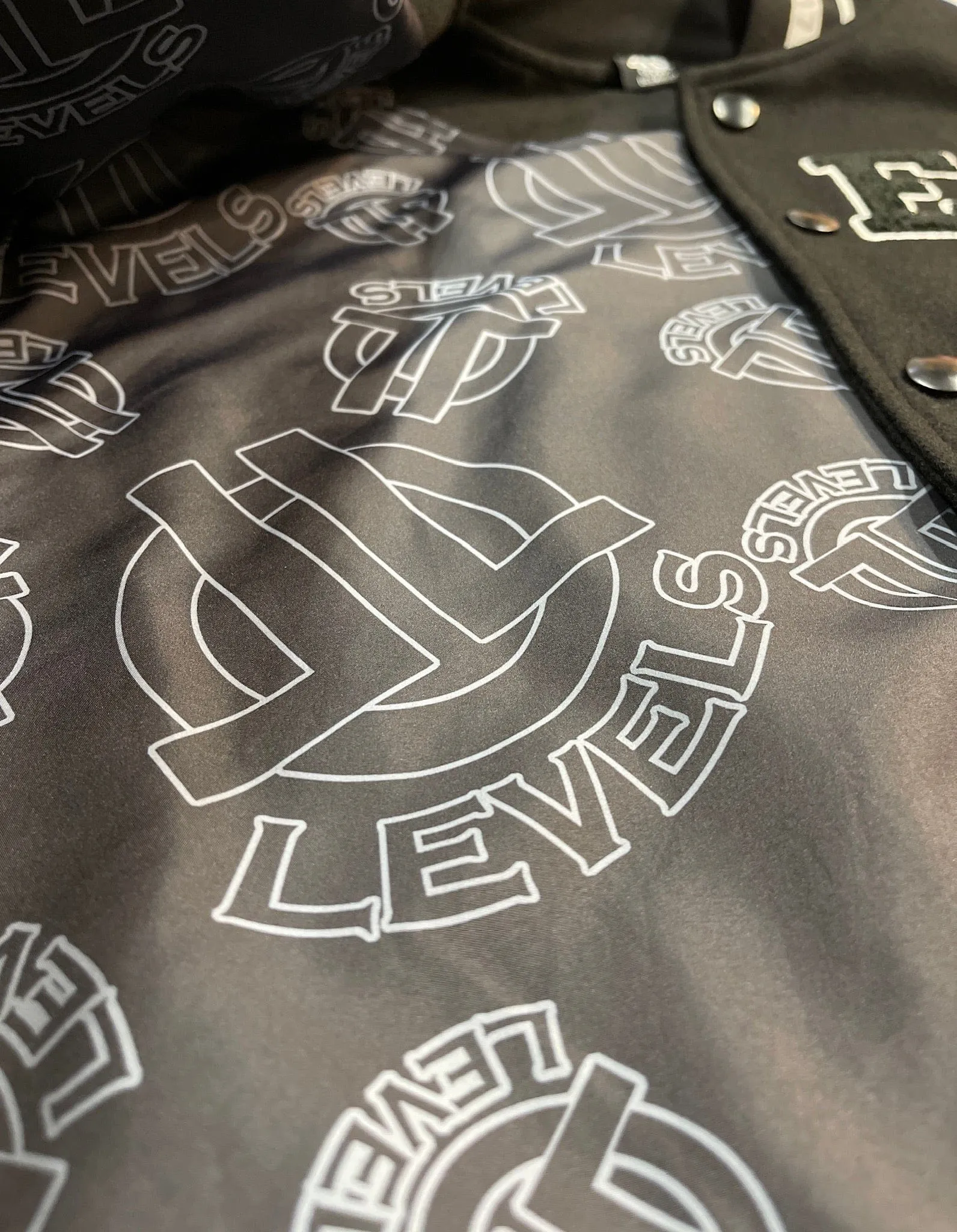 LEVELS CITY VARSITY JACKET | RED EDITION